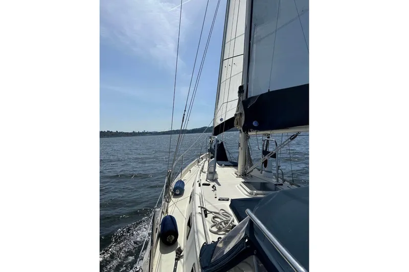 Slide: The Image of Sailing on a 1990 Pacific Seacraft PSC 37 yacht under clear skies. - 2