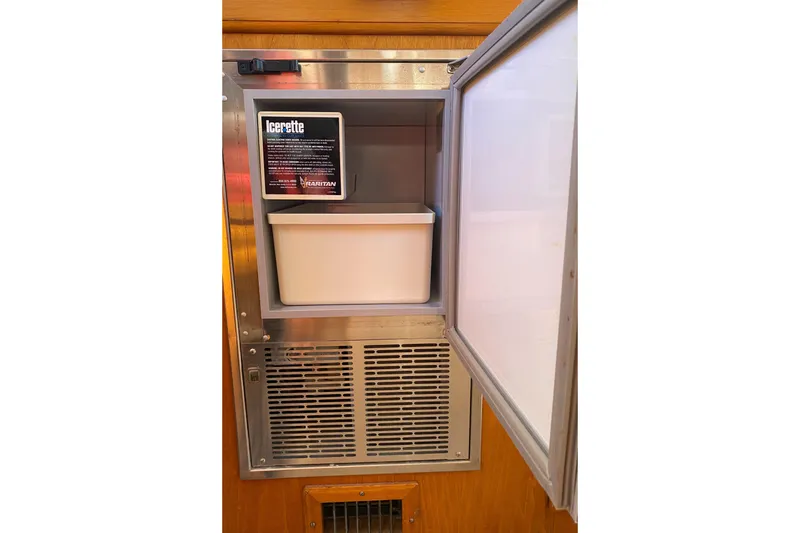 Slide: The Image of Ice maker inside 1988 Jarvis Newman 46' Flybridge Downeast yacht, featuring Raritan Icerette. - 23