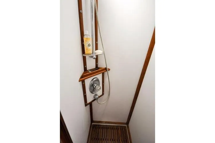 Slide: The Image of Shower area in 1987 Jarvis Newman 46' Flybridge Cruiser with wooden accents. - 60