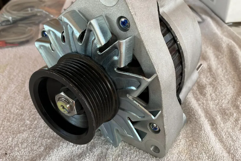 Slide: The Image of Alternator for 1987 Jarvis Newman Lyman Morse 46' Flybridge Cruiser on a towel. - 88