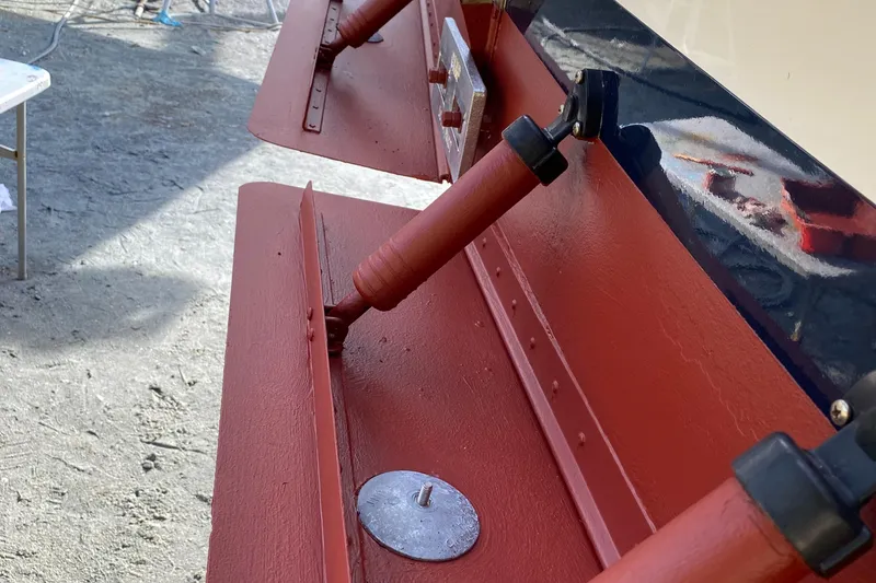 Slide: The Image of Close-up of 1987 Jarvis Newman 46' Flybridge Cruiser's trim tabs and hydraulic system. - 94