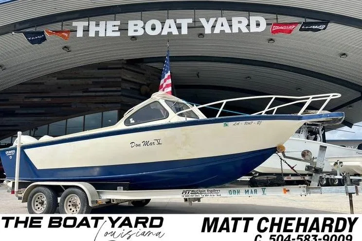 Slide: The Image of 1984 Gravois 22 DC boat on trailer at The Boat Yard, Louisiana. - 14