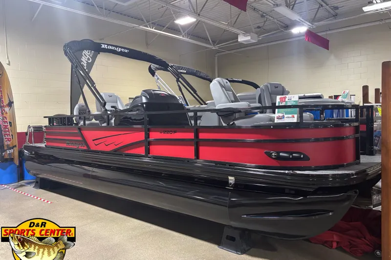The Image of 2026 Ranger Reata 220F pontoon boat displayed indoors at D&R Sports Center. - 0