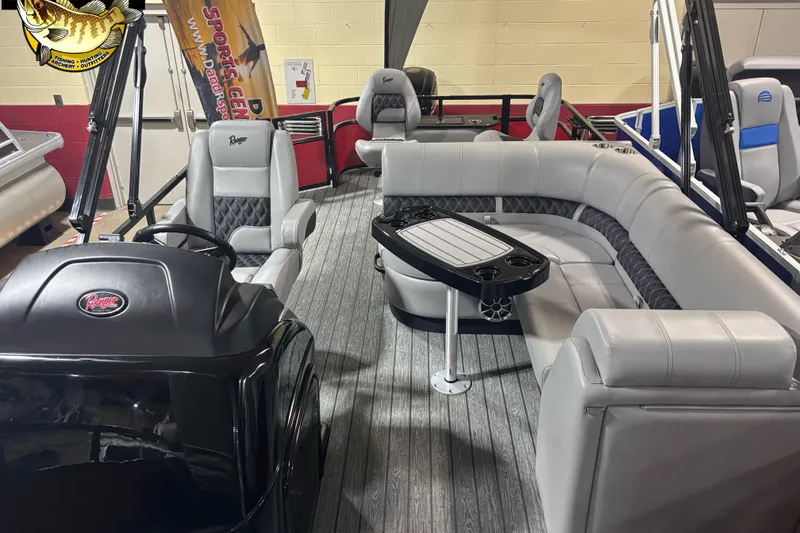 Slide: The Image of 2026 Ranger Reata 220F boat interior with gray seating and steering console. - 3
