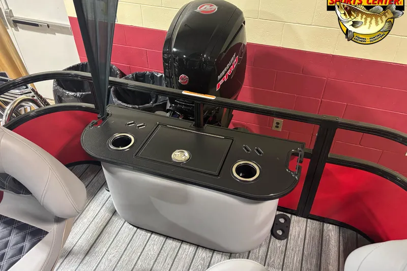 Slide: The Image of 2026 Ranger Reata 220F boat interior with motor and seating, featuring a sleek design. - 6