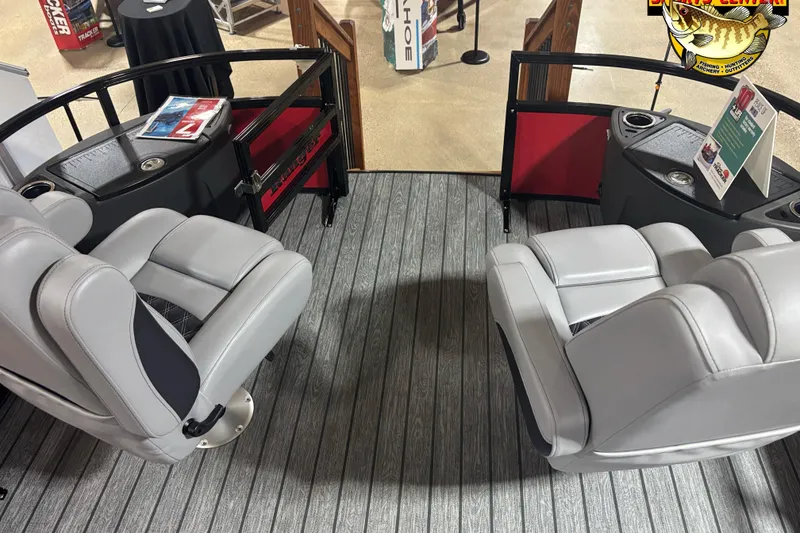 Slide: The Image of 2026 Ranger Reata 220F boat interior with gray seating and modern design. - 8