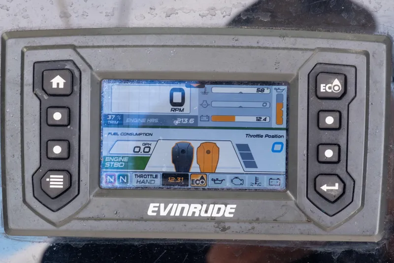 Slide: The Image of Evinrude engine display on 1989 Blackfin 272 CC showing RPM and fuel consumption. - 8