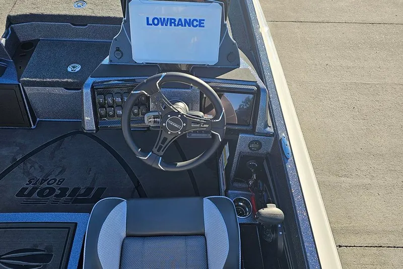 Slide: The Image of Interior of 2026 Triton 20XP Patriot boat showing capacity and safety labels. - 15