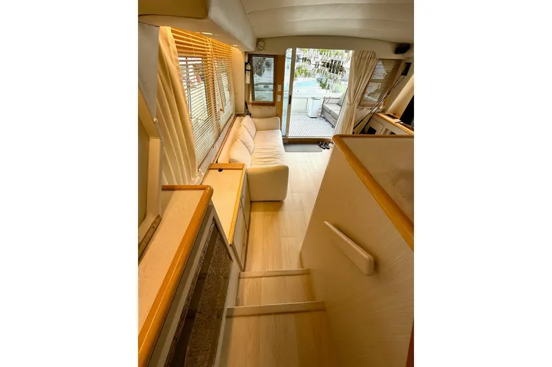 Slide: The Image of Looking aft from Companionway stairs to Salon and Cockpit - 13