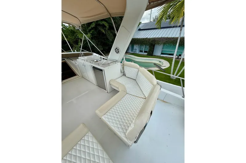 Slide: The Image of Flybridge deck with cushioned seating, starboard - 21