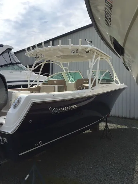 Slide: The Image of Sailfish 325 Dual Console boat, 2017 model, in a storage facility. - 10