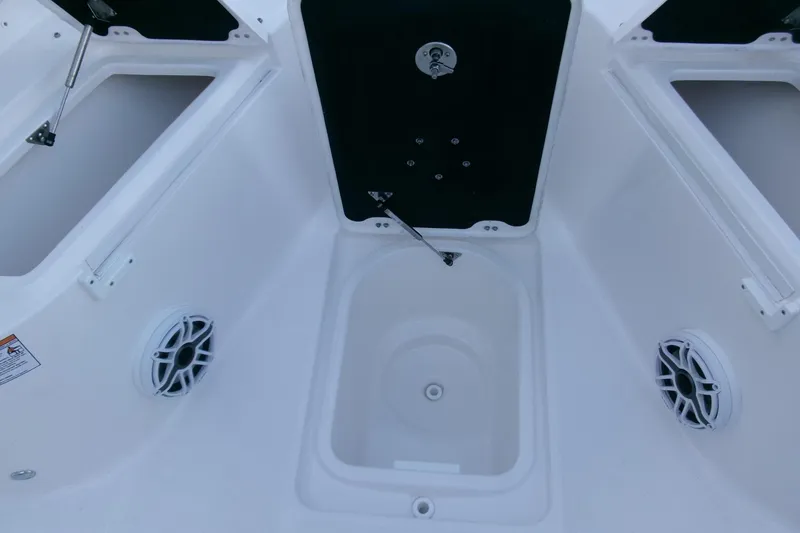 Slide: The Image of 2026 Sea Fox 288 Commander boat interior storage compartments and speakers. - 13