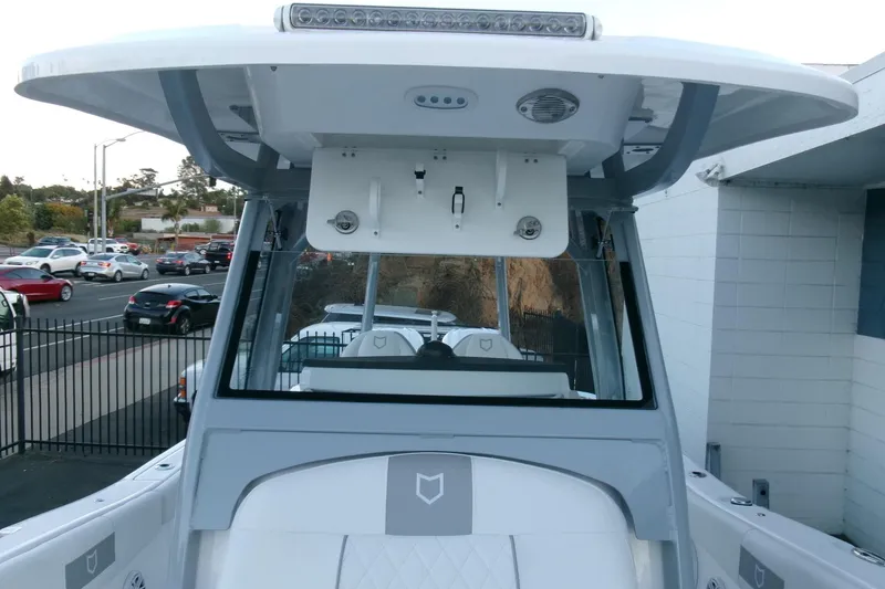 Slide: The Image of 2026 Sea Fox 288 Commander boat with modern helm and T-top design. - 17