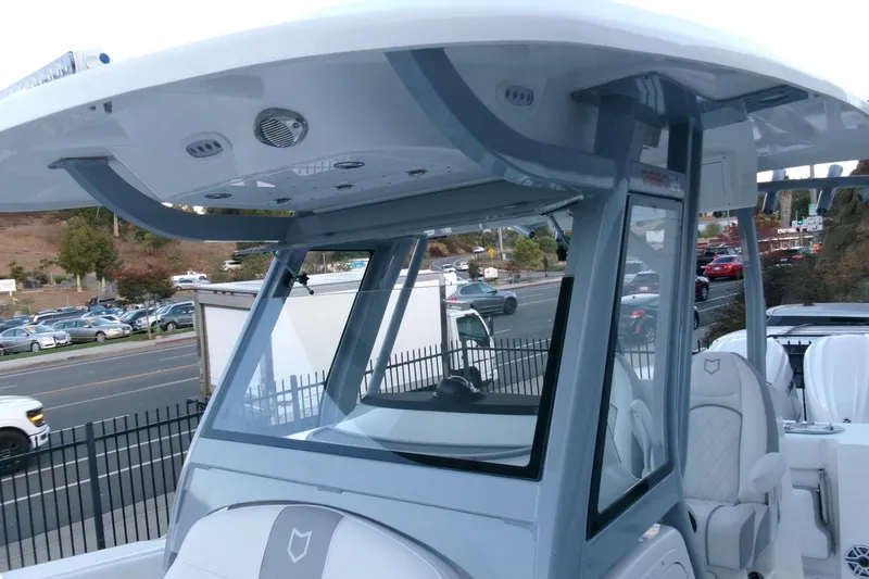 Slide: The Image of 2026 Sea Fox 288 Commander boat with modern helm and seating design. - 26