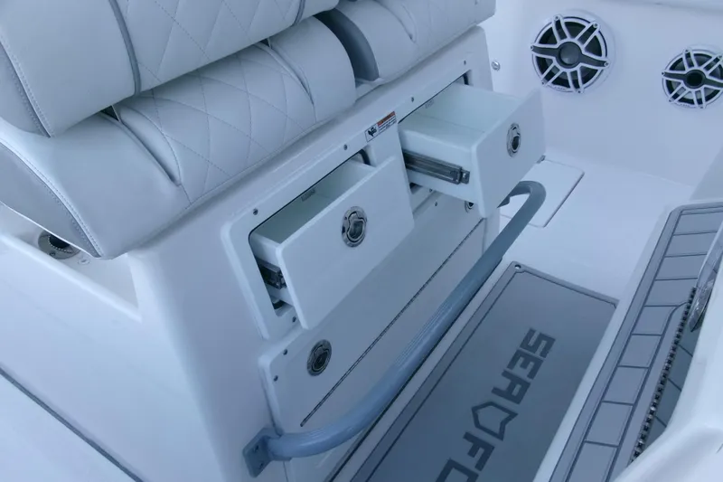 Slide: The Image of 2026 Sea Fox 288 Commander boat interior with storage drawers and seating. - 30