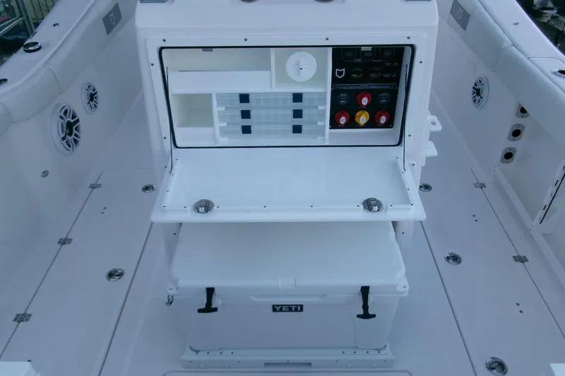 Slide: The Image of 2026 Sea Fox 288 Commander boat interior with storage and control panel. - 32