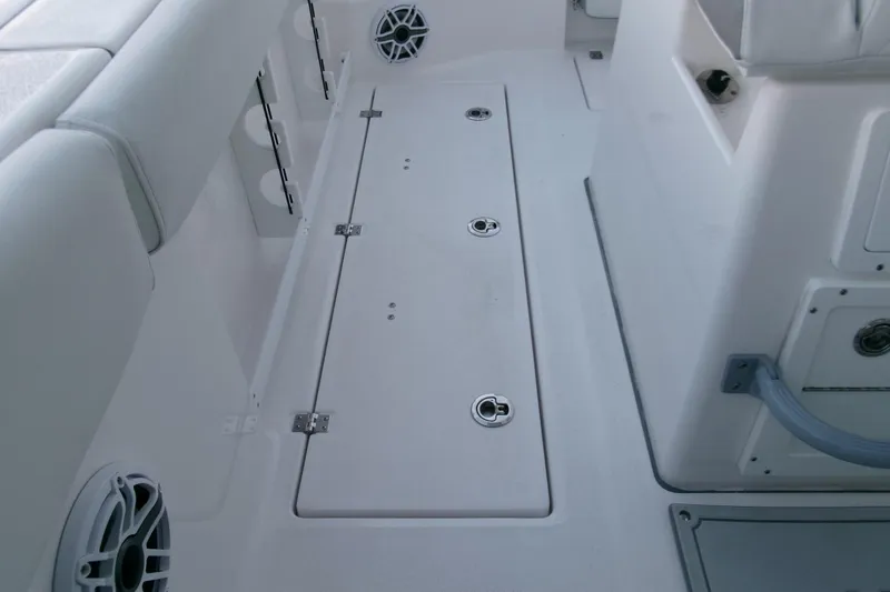 Slide: The Image of 2026 Sea Fox 288 Commander boat interior with storage compartments and speakers. - 33