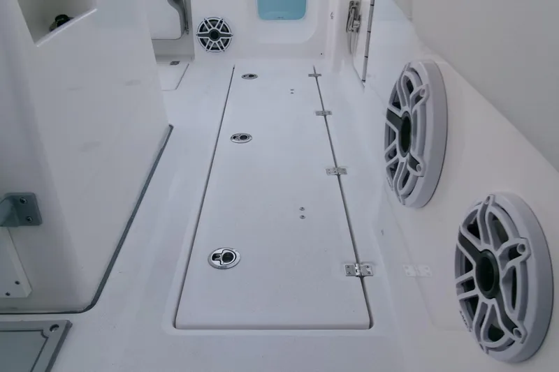 Slide: The Image of 2026 Sea Fox 288 Commander boat interior with speakers and storage compartments. - 35