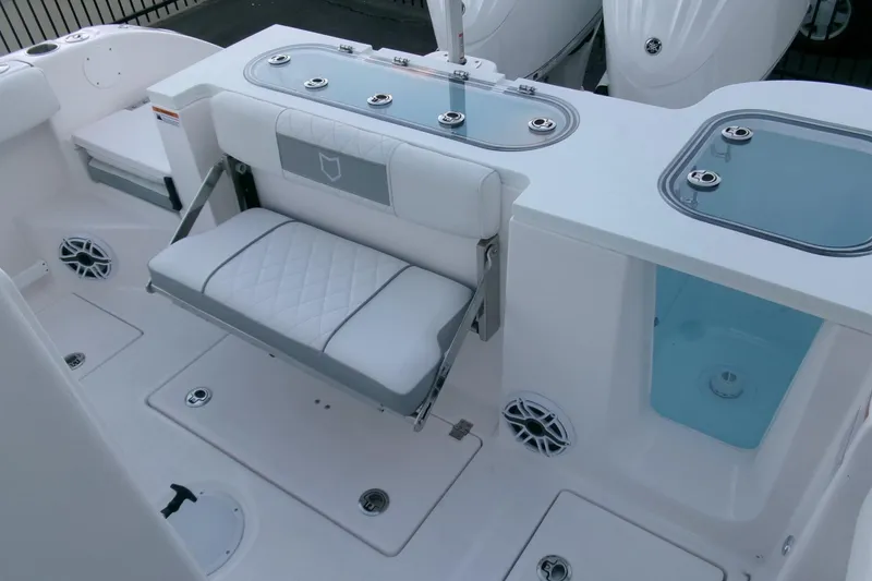Slide: The Image of 2026 Sea Fox 288 Commander boat interior with seating and storage compartments. - 38