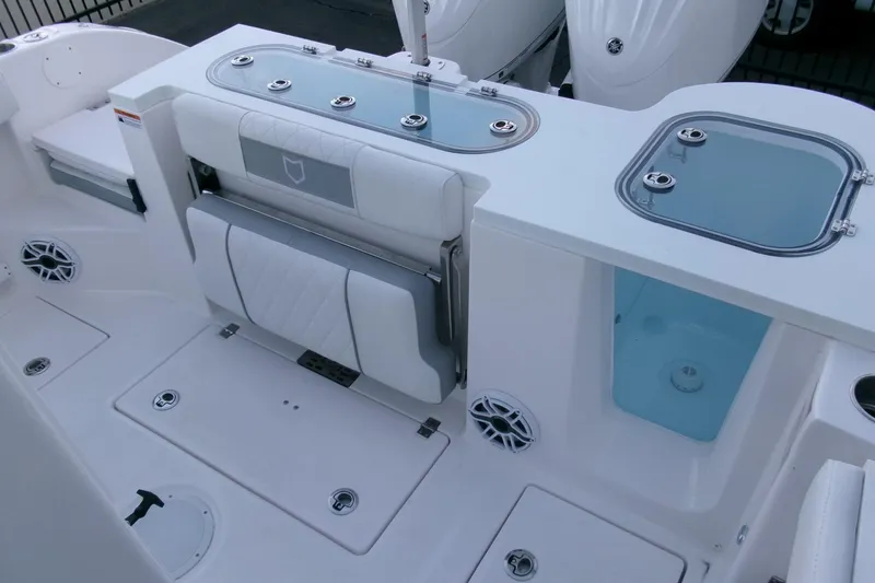 Slide: The Image of 2026 Sea Fox 288 Commander boat interior with seating and storage compartments. - 39