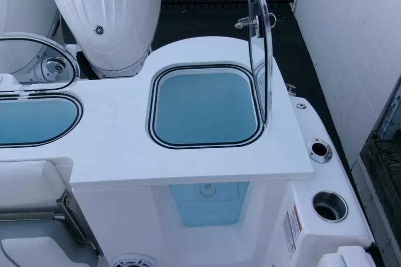 Slide: The Image of 2026 Sea Fox 288 Commander boat interior with open storage compartments. - 42