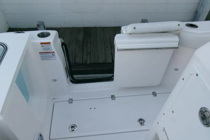 Slide: The Image of 2026 Sea Fox 288 Commander boat interior with seating and storage compartments. - 44