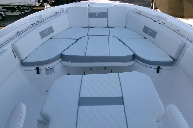 Slide: The Image of 2026 Sea Fox 288 Commander boat interior with cushioned seating and elegant design. - 9