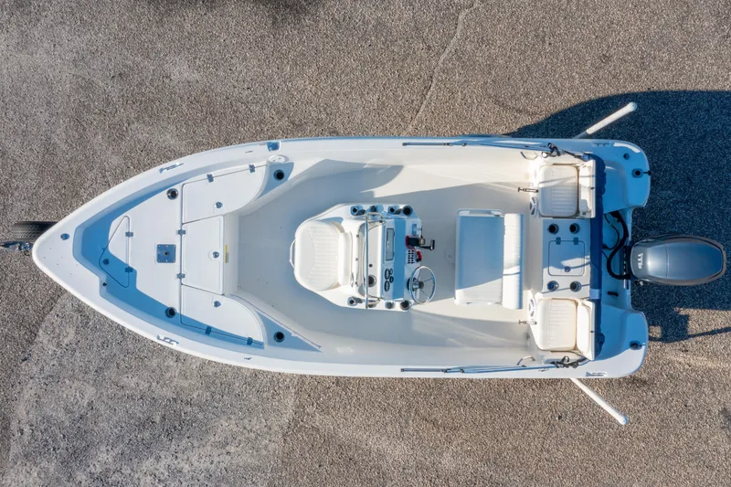 Slide: The Image of 2011 NauticStar 1910 NauticBay boat on trailer with Yamaha outboard motor. - 24