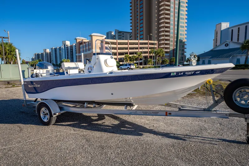 Slide: The Image of Overhead view of 2011 NauticStar 1910 NauticBay boat on pavement. - 25