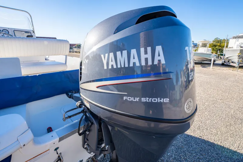 Slide: The Image of Largest pre-owned boat lot, Orange Beach Boat & Yacht Sales, offering thorough inspections and financing. - 4