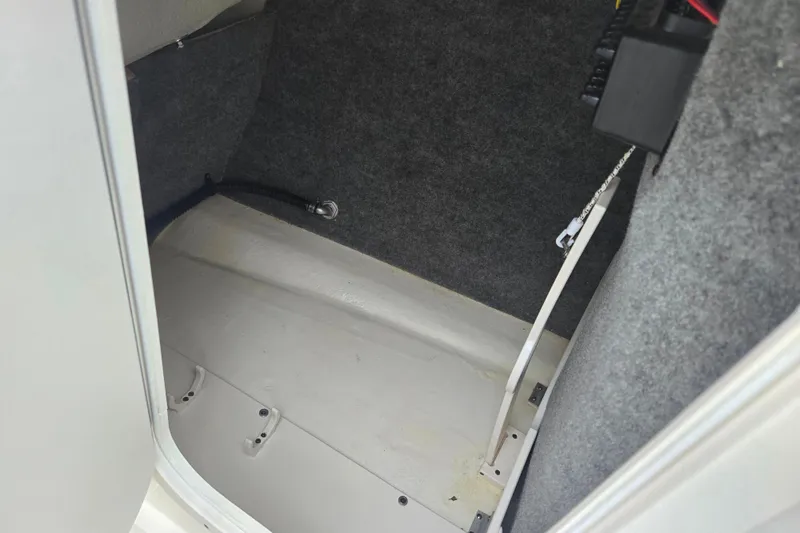Slide: The Image of Interior storage compartment of 2016 Chaparral Vortex 243 VRX boat. - 17