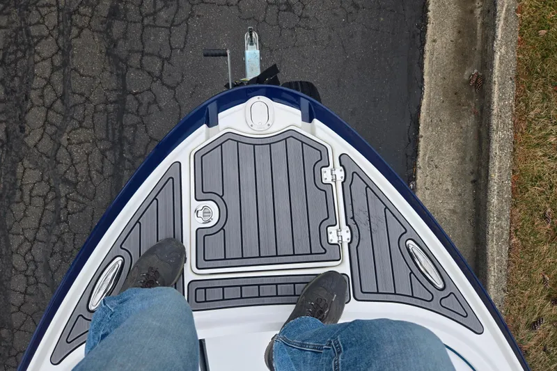 Slide: The Image of Top view of 2016 Chaparral Vortex 243 VRX bow with person standing on deck. - 19