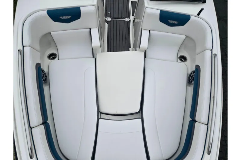 Slide: The Image of 2016 Chaparral Vortex 243 VRX boat interior with white and blue seating. - 20