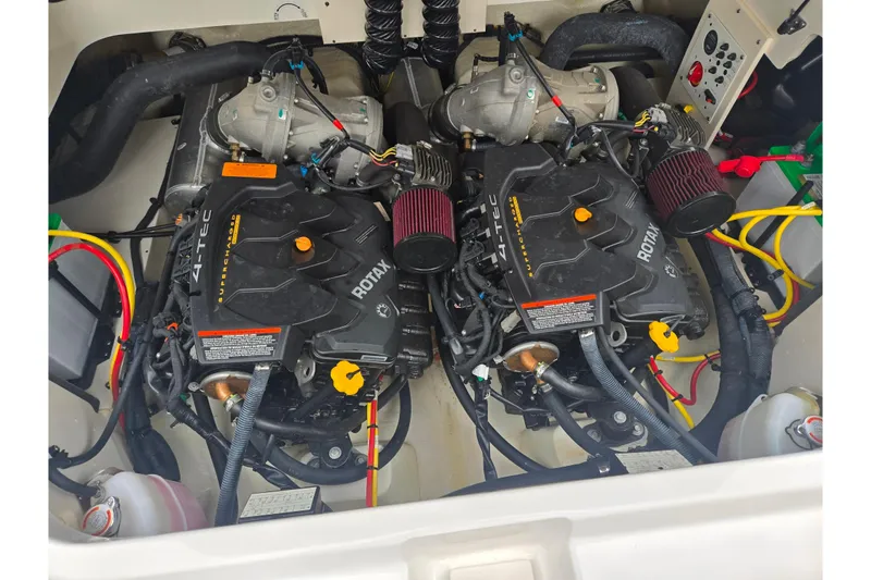 Slide: The Image of Engine compartment of 2016 Chaparral Vortex 243 VRX with dual Rotax engines. - 24