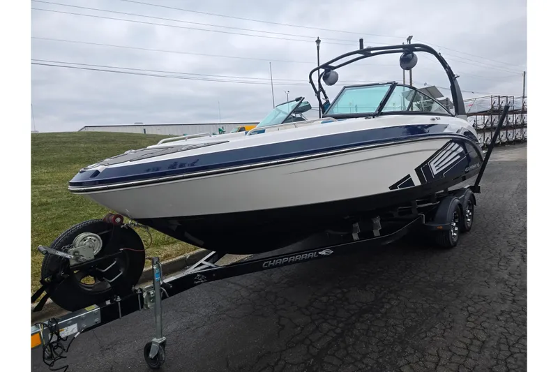 Slide: The Image of 2016 Chaparral Vortex 243 VRX boat on trailer, parked outdoors. - 5