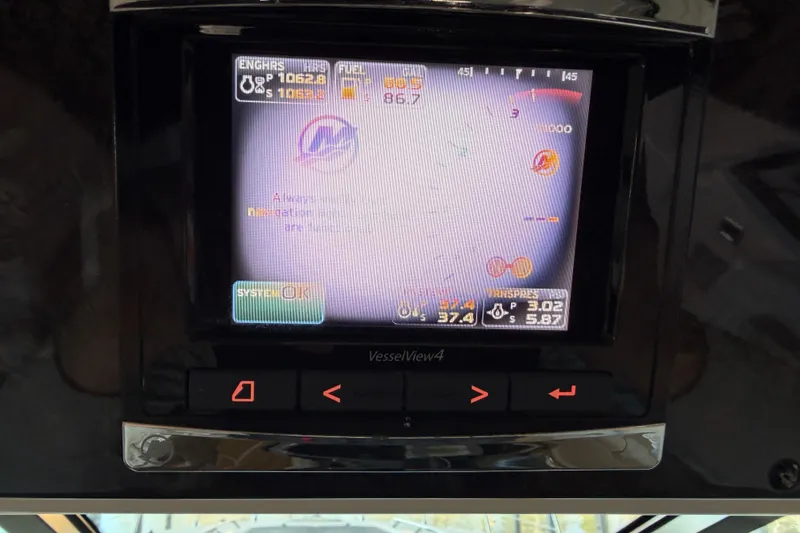 Slide: The Image of Display screen of a 2014 Sea Ray 540 Sundancer showing engine and fuel data. - 27