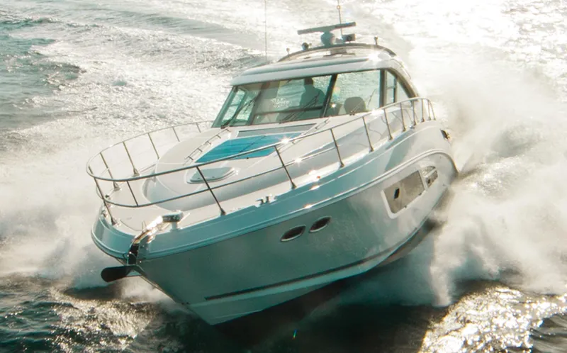 Slide: The Image of Manufacturer Provided Image: 2014 Sea Ray 540 Sundancer yacht cruising on open water. - 5