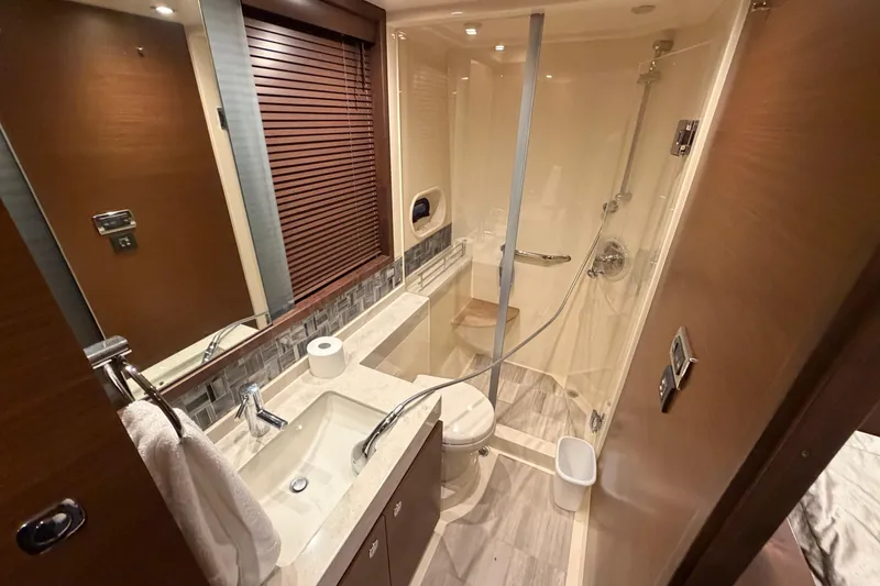 Slide: The Image of Luxurious bathroom in 2014 Sea Ray 540 Sundancer yacht with modern fixtures and shower. - 51