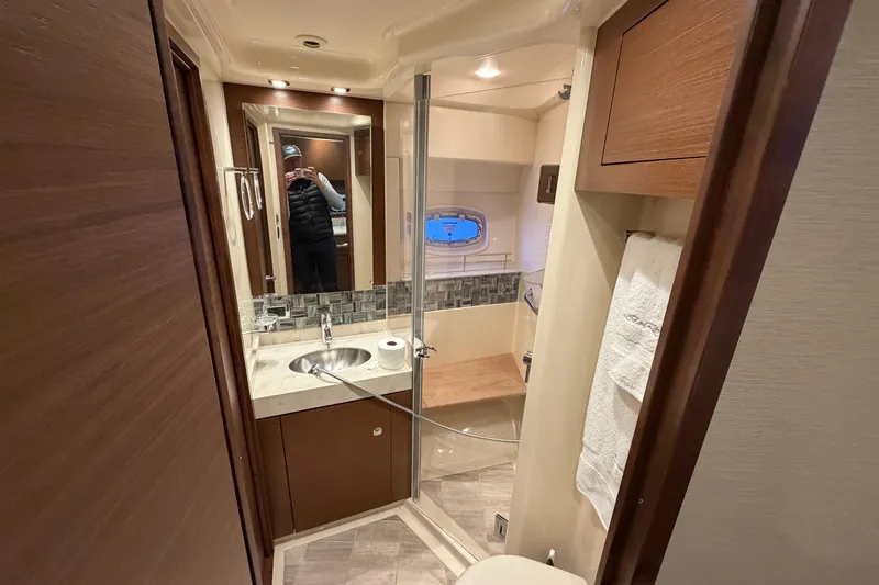 Slide: The Image of Luxurious bathroom interior of 2014 Sea Ray 540 Sundancer yacht with modern fixtures. - 54
