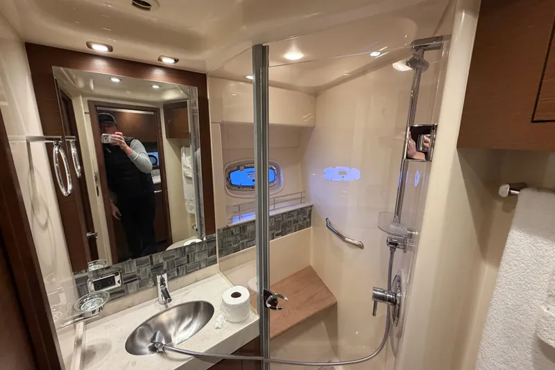 Slide: The Image of Luxurious bathroom in 2014 Sea Ray 540 Sundancer yacht with modern fixtures and shower. - 55