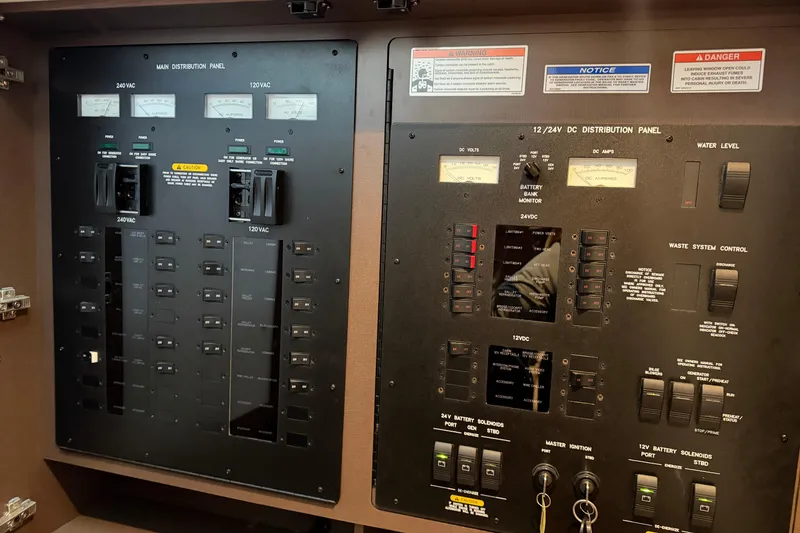 Slide: The Image of Electrical control panel on a 2014 Sea Ray 540 Sundancer yacht. - 61