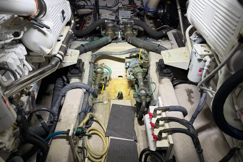 Slide: The Image of Engine room of 2014 Sea Ray 540 Sundancer yacht, showcasing mechanical components and systems. - 67