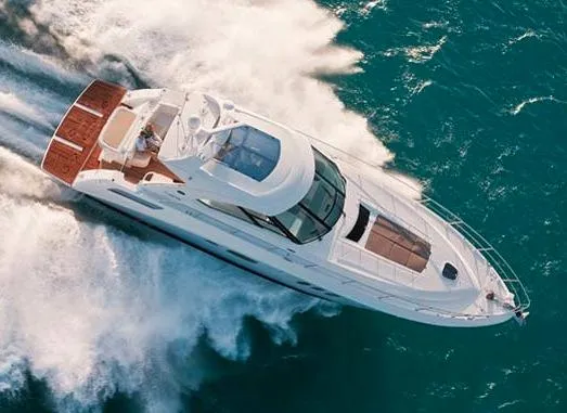 Slide: The Image of Manufacturer Provided Image: 2014 Sea Ray 540 Sundancer yacht cruising on open water. - 7