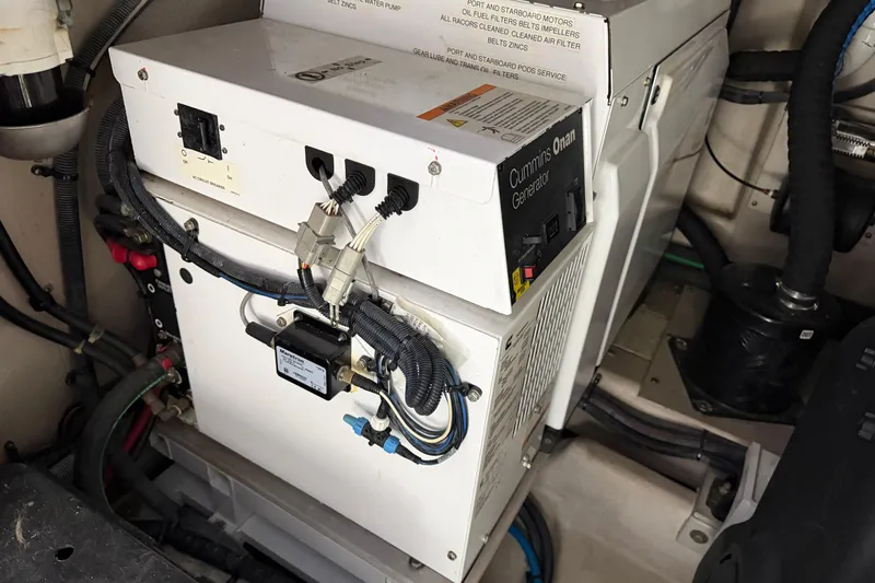 Slide: The Image of Cummins Onan generator in a 2014 Sea Ray 540 Sundancer yacht engine room. - 74