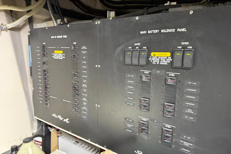 Slide: The Image of Main breaker and battery solenoid panels on 2014 Sea Ray 540 Sundancer yacht. - 83