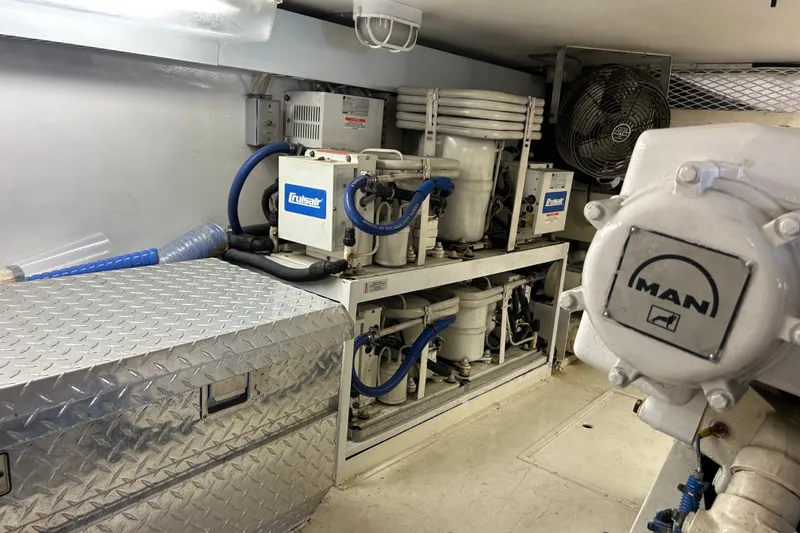 Slide: The Image of Engine room of a 1997 Viking 58 Enclosed Bridge yacht with MAN components. - 30