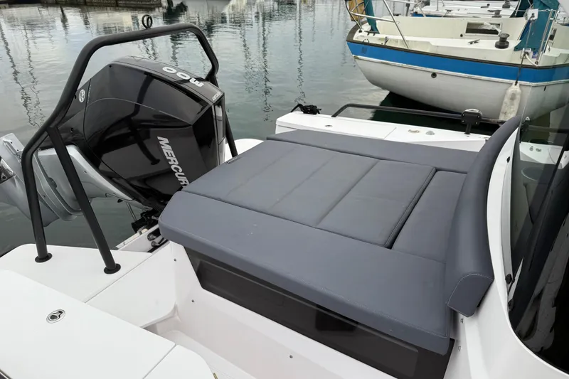 Slide: The Image of 2021 Axopar 28 Cabin boat with Mercury engine, docked at marina. - 3