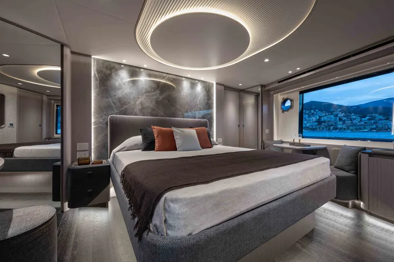 Slide: The Image of Luxurious bedroom interior of 2027 Absolute Navetta 66 yacht with scenic ocean view. - 54