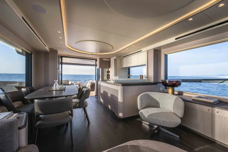 Slide: The Image of Luxurious interior of 2027 Absolute Navetta 66 yacht with ocean view and modern furnishings. - 47
