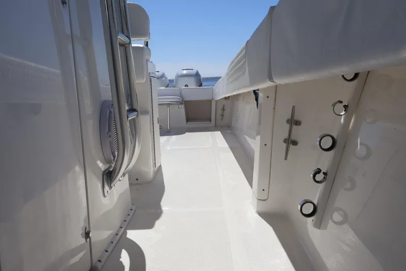Slide: The Image of 2005 Venture 39 Open boat interior with sleek white deck and fittings. - 9